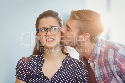 Affectionate man kissing woman Affectionate man kissing woman
