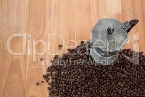 Coffee beans with metallic coffeemaker