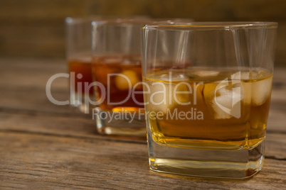 Three glasses of whiskey