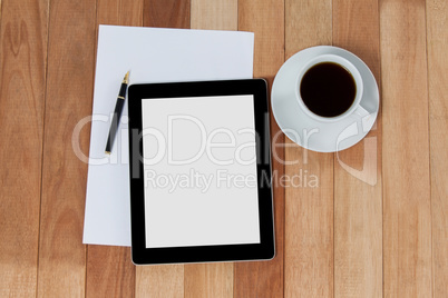 Black coffee with digital tablet and paper
