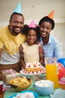 Portrait of family celebrating a birthday