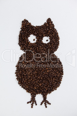 Coffee beans forming owl