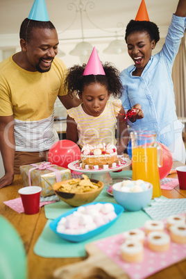 Happy family celebrating a birthday