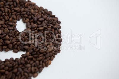 Coffee beans forming smiley face