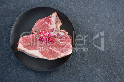 Sirloin chops garnished with shredded cabbage