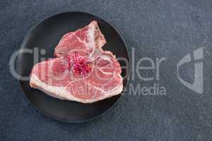 Sirloin chops garnished with shredded cabbage