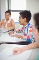 Students studying in classroom