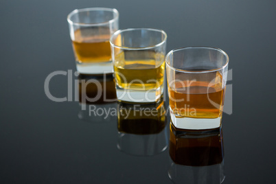 Three glasses of whiskey