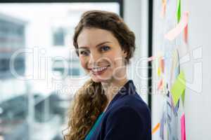 Beautiful woman smiling in office