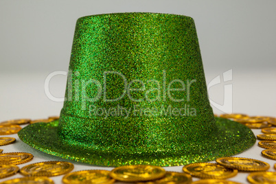 St Patricks Day leprechaun hat surround with gold chocolate coins