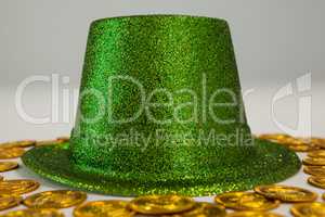 St Patricks Day leprechaun hat surround with gold chocolate coins