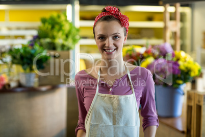 Female florist standing in the florist shop