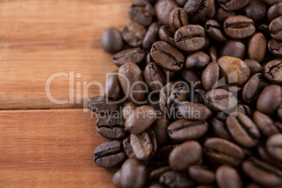 Coffee beans on wooden table