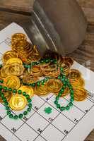 St. Patricks Day chocolate gold coins and beads kept on calendar