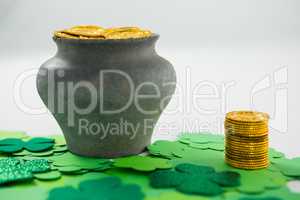 St. Patricks Day shamrocks and pot filled with chocolate gold coins