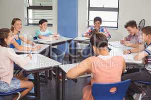 Students studying in classroom