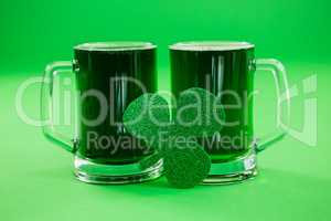St Patricks Day two mugs of green beer with shamrock
