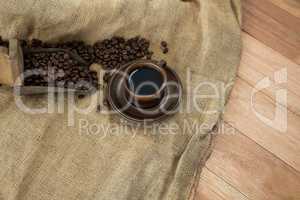 Black coffee with scoop and sack textile