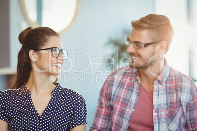 Smiling couple wearing spectacles