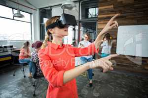 Business executive using a virtual reality headset