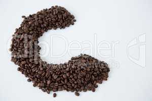 Coffee beans forming alphabet C
