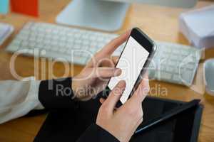 Close-up of woman using mobile phone