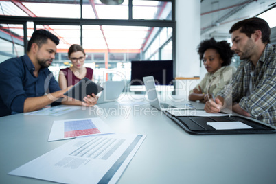 Business executives discussing in a meeting