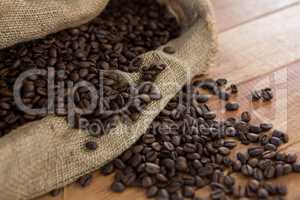 Roasted coffee beans in sack bag