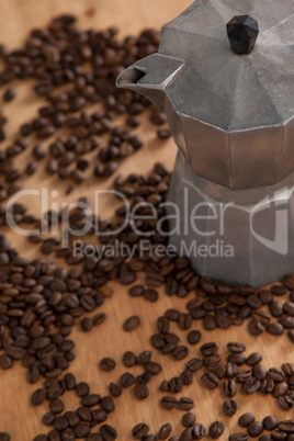Metallic coffee maker with coffee beans