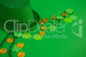 St. Patricks Day leprechaun hat, chocolate gold coins, beads and shamrocks