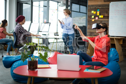 Business executive using a virtual reality headset