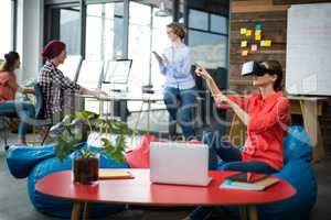 Business executive using a virtual reality headset