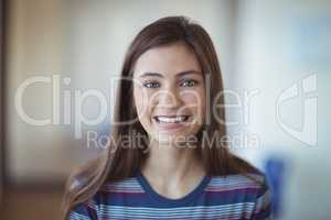 Portrait of smiling schoolgirl