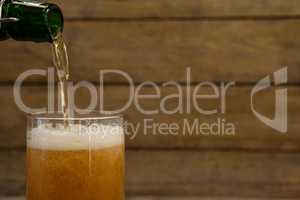 Beer being poured into a glass