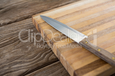 Knife on wooden tray