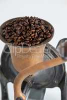 Vintage coffee grinder with coffee beans