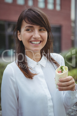 Executive having veg roll on road