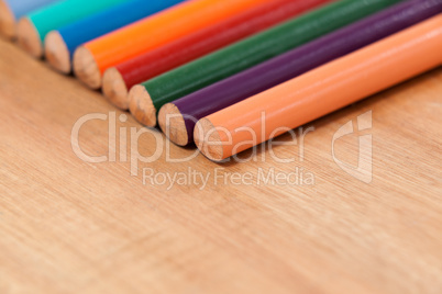 Close-up of colored pencil in a row