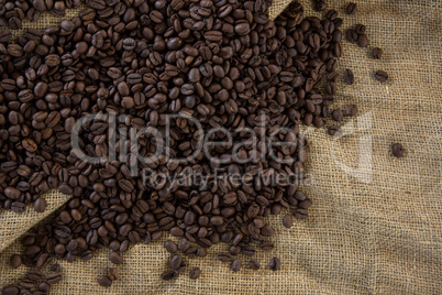 Roasted coffee beans on sack