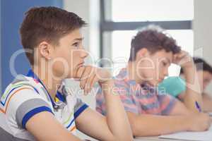 Students studying in classroom