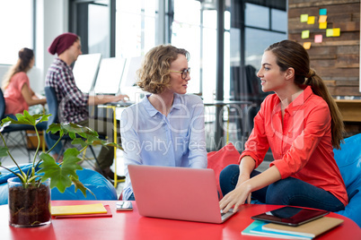 Business executives discussing with each other