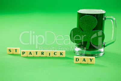 St Patricks Day blocks with mug of green beer and shamrock