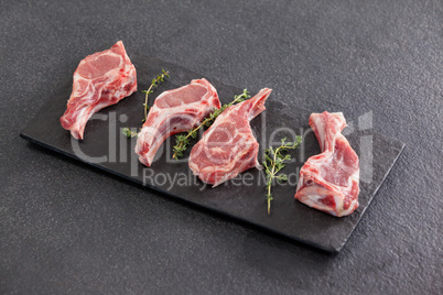 Rib chop and herb on black slate plate