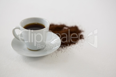 Black coffee with cinnamon powder
