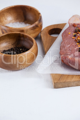 Sirloin chop, salt and black pepper