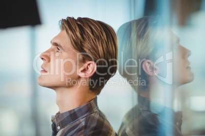 Business executive standing in office