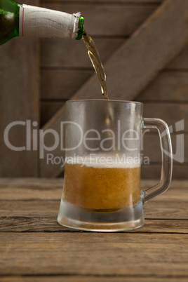 Beer being poured into a mug