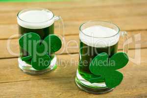 St Patricks Day two mugs of green beer with shamrock