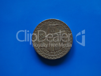 One Pound (GBP) coin, United Kingdom (UK) over blue