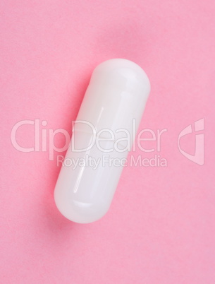 White Pill on Pink Background